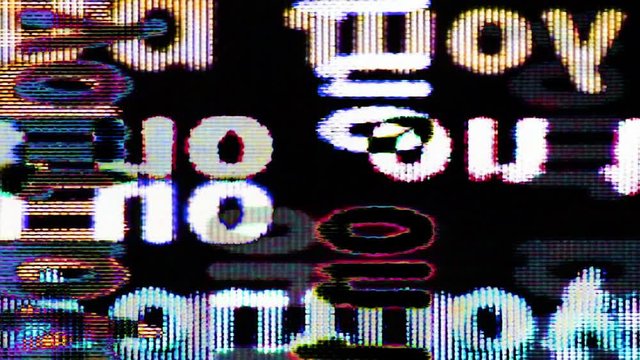 Video Flux 067: Television screen pixels fluctuate with color and video motion (Loop).