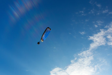 paratrooper parachute on sky.