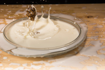 Walnut in milk splash