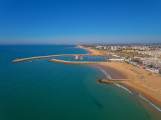 Fototapeta na wymiar Fishing port of Quarteira, the view from the sky.