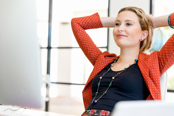 Young woman in office