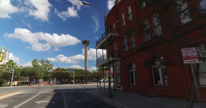 SAN ANTONIO, TX - Circa September, 2016 - A driver's perspective on the streets of San Antonio, Texas with the Tower of the Americas in the distance.	 	