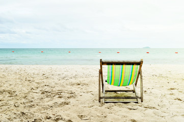 Sunbed on the beach at sunset