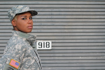 Serious Proud Black Female Soldier with Space for Copy