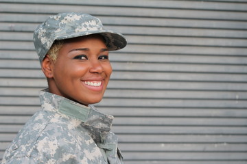 Military female smiling with copy space
