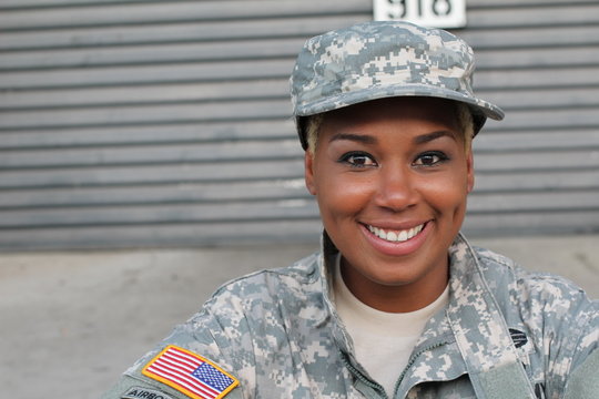 Veteran Soldier smiling and laughing. African American Woman in the military.