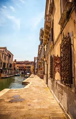Fototapete Rund VENICE, ITALY - AUGUST 17, 2016: Famous architectural monuments and colorful facades of old medieval buildings close-up on August 17, 2016 in Venice, Italy. © Unique Vision