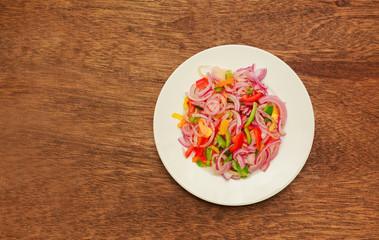 Grilled vegetables salad onions, peppers and tomato