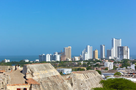 A view on the city from San Filipe de Barajas Castle in Cartagena, Colombia. Cartagena skyline and Caribbean Sea on a bright morning.