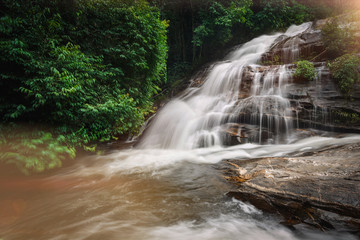 Beautiful natural of Pha Dokseaw Waterfall of Rainy Season, a major tourist attraction in Chiangmai, Thailand. This is a location very popular for photographers and tourists.