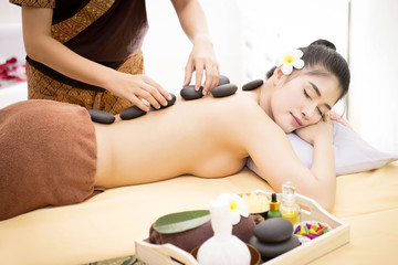 Fototapeta na wymiar Women pay attention to health and beauty. The spa facial and body massage.