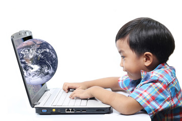 Asian boy is learning about the world through the Internet isolated on a white background.