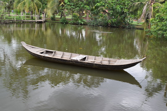 traditional asian fishing boat in river