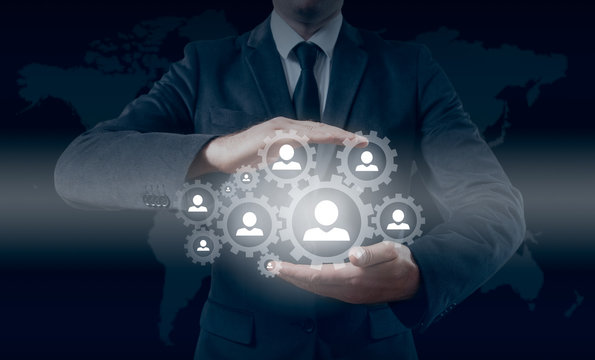 Hand carrying businessman icon network - HR,HRM,MLM, teamwork and leadership concept