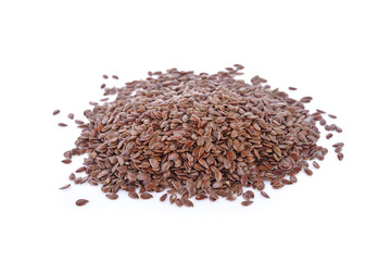 pile of dry flaxseed on white background