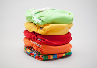 Stack of cloth diapers different colors