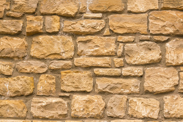 Brown wall with masonry, background