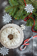 Christmas cake with icing and snowflakes.