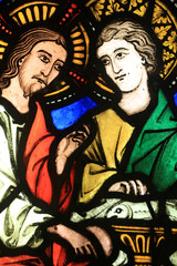 Fototapeta na wymiar Détail. Marie Madeleine aux pieds du Christ. Musée de l'Oeuvre Notre-Dame de Strasbourg. Gothic stained glass window. 