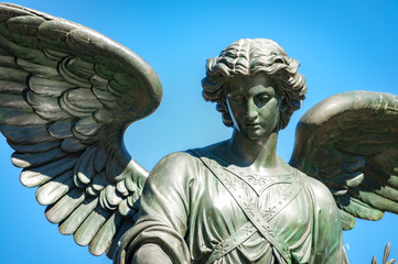 Fototapeta na wymiar Angel of the waters is the statue on top of the Bethesda Fountain, in Central Park, Midtown Manhattan, New York, USA