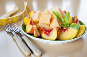 sliced fruits peach melon