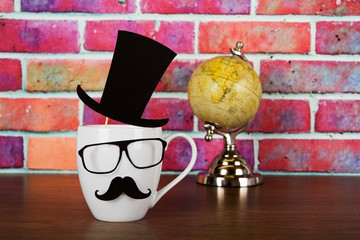 Coffee cup with a black hipster mustache