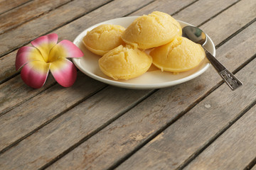 Sugarpalm cake on wood background.