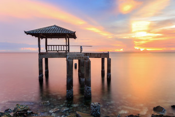 Fototapeta premium Old pavilion at sunset and soft sea