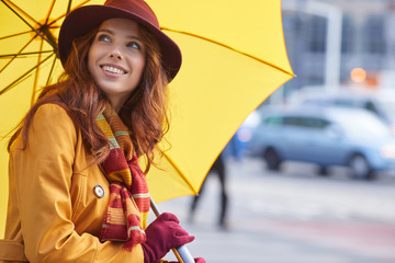 Woman in autumn city