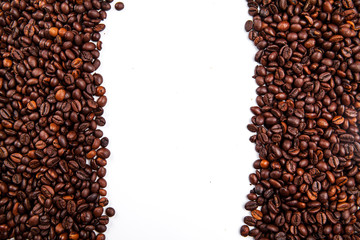 Frame of roasted coffee beans isolated on white