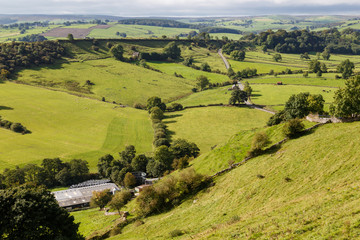 View of farm land and River Dove in Crowdecote