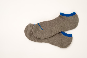 Pair of socks on white background.