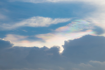 Naklejka na ściany i meble Iridescence cloudy rainbow sky 