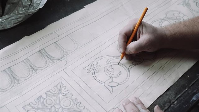 Engineer designer drawing ornament for architect project