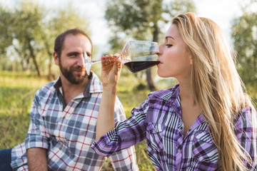 Woman Tasting Wine in the Garden