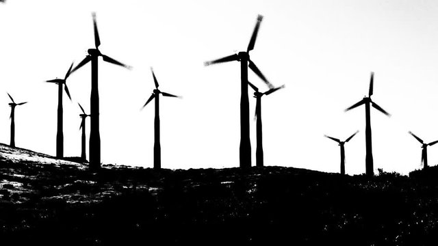 High contrast video of wind turbines.