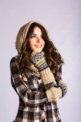 girl wearing a scarf and gloves