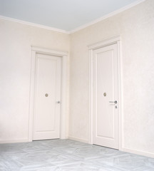 Close up of closed wooden door in the empty room