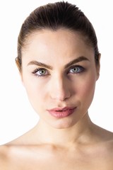 Fototapeta premium Portrait of beautiful woman posing against white background