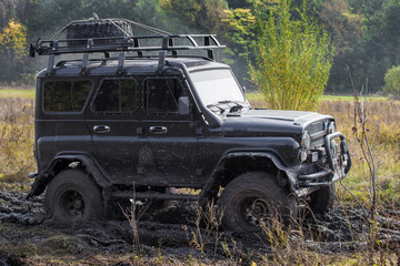 Off road car moving in the mud