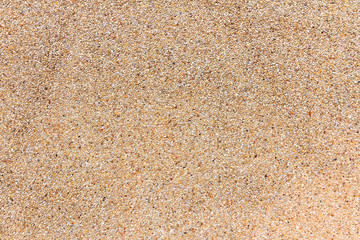 Small sand stone of sand wall texture or sand wall background. Natural brown sand stone for design with copy space for text or image.
