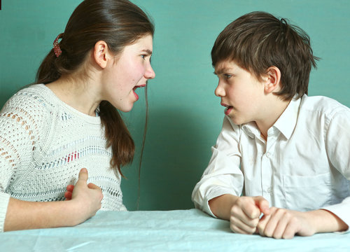 Siblings Boy And Girl Arguin Close Up Photo