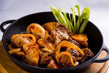 pan fried meat with onion