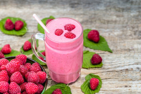 Yogurt smoothie with raspberries, fruit dessert, healthy dieting