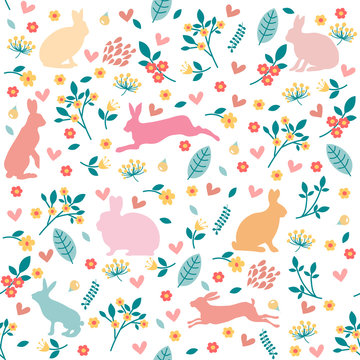 Rabbits in hearts and flowers.