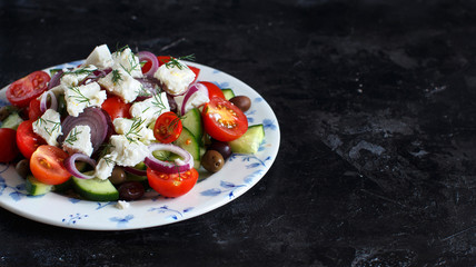 Greek salad on a dark background