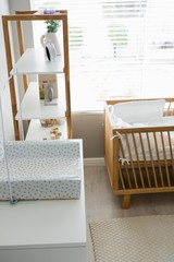 Showpiece on shelf with cradle