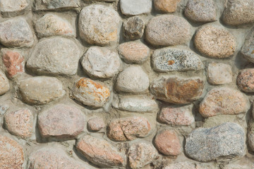 different stones in wall at background