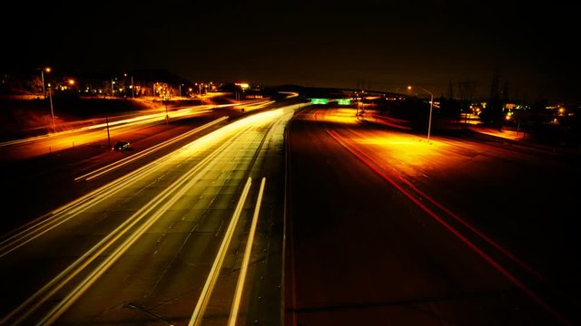 A late night time lapse of traffic on a major freeway.