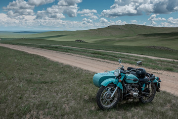 Old russian sidecar on a trail in Mongolia, Asia - obrazy, fototapety, plakaty